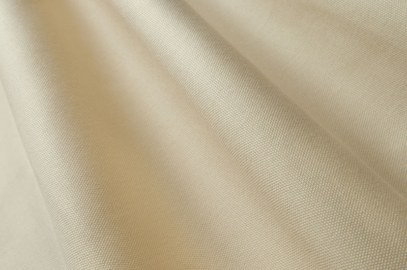 Tovagliato in cotone avorio drappeggiato